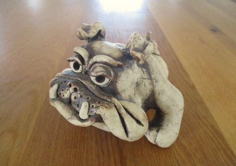 Batch of four antique and vintage dogs