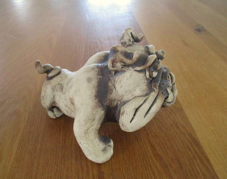 Batch of four antique and vintage dogs