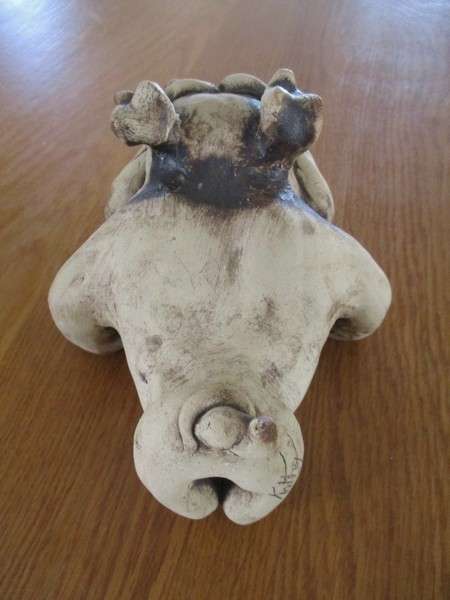 Batch of four antique and vintage dogs