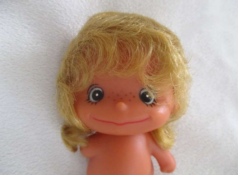 A touching story to read .... Small vintage  "Love is" doll