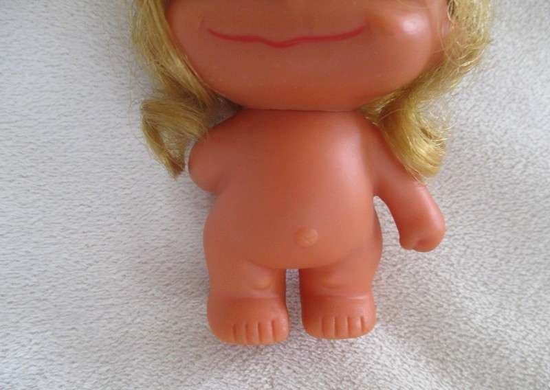 A touching story to read .... Small vintage  "Love is" doll