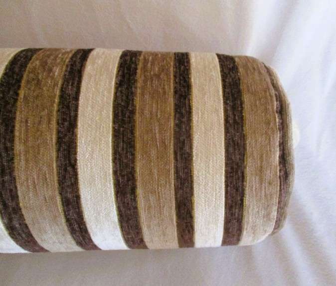 A very well made long, round cushion