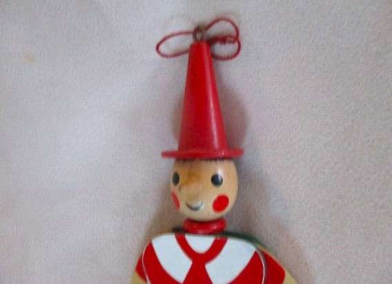 Two cute vintage wooden Pinocchios