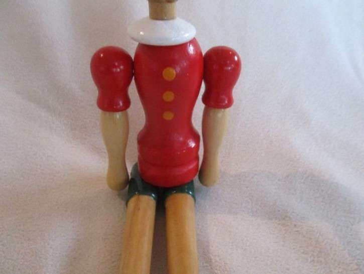 Two cute vintage wooden Pinocchios