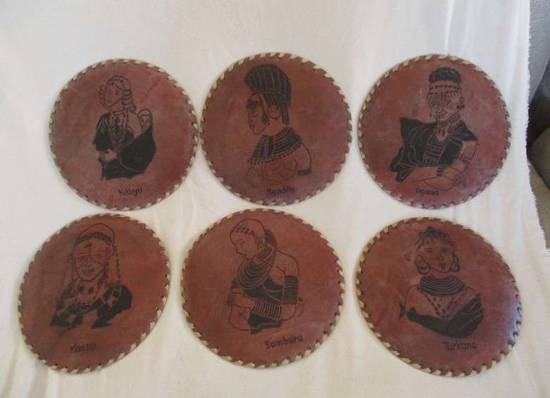 Vintage and very unique - hand crafted real leather mats of various Kenyan tribes