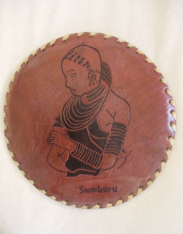 Vintage and very unique - hand crafted real leather mats of various Kenyan tribes