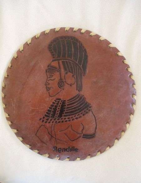 Vintage and very unique - hand crafted real leather mats of various Kenyan tribes