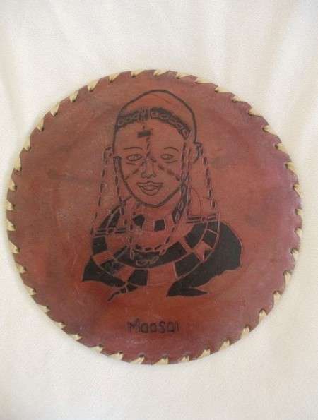 Vintage and very unique - hand crafted real leather mats of various Kenyan tribes