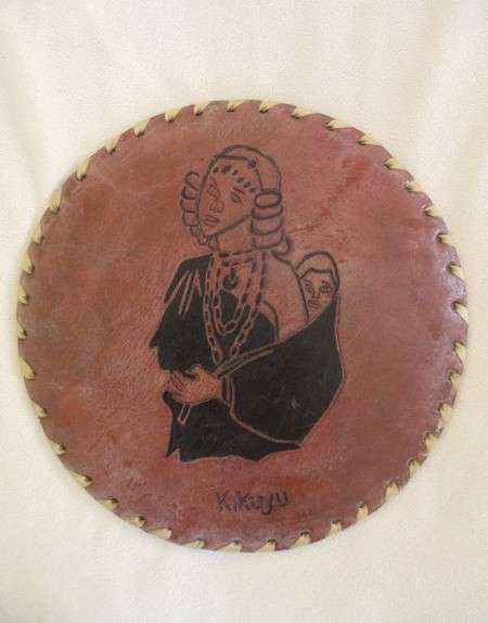 Vintage and very unique - hand crafted real leather mats of various Kenyan tribes