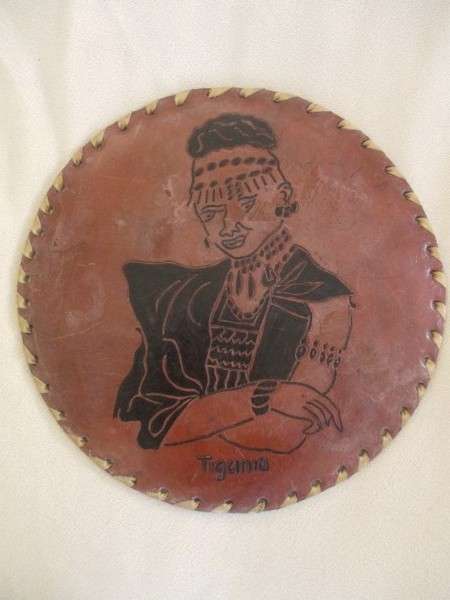 Vintage and very unique - hand crafted real leather mats of various Kenyan tribes