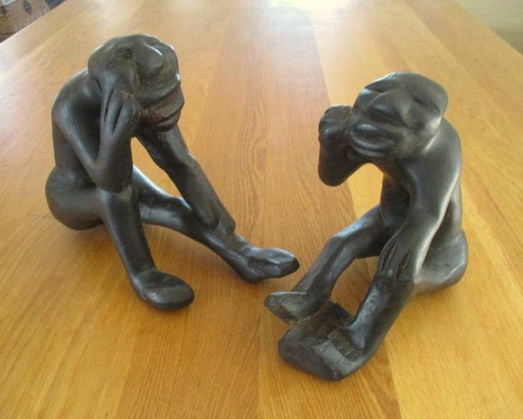 Awesome sculptures!!  Rodin's Thinkers African style - hand carved wood