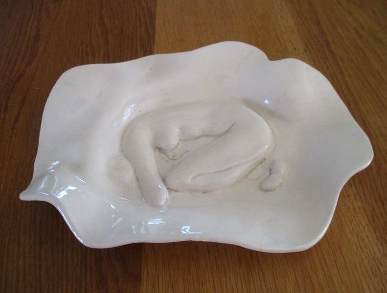 Striking art porcelain dish with figure of nude woman - signed