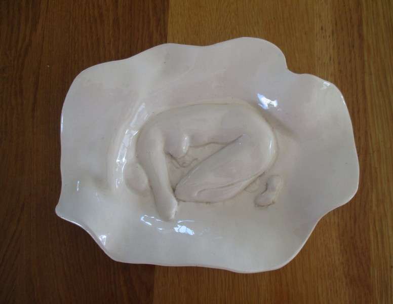 Striking art porcelain dish with figure of nude woman - signed