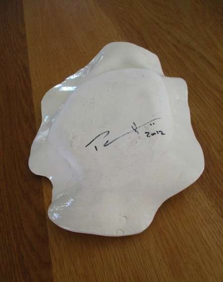 Striking art porcelain dish with figure of nude woman - signed