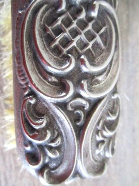 Two antique Victorian Art Nouveau repousse silver plated clothes brushes