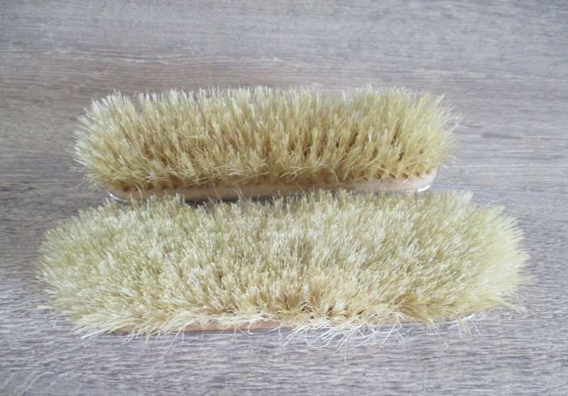 Two antique Victorian Art Nouveau repousse silver plated clothes brushes