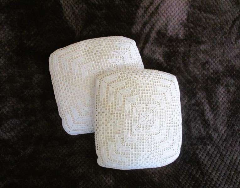 Two vintage hand crocheted cushions