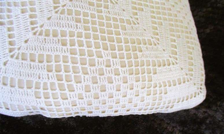 Two vintage hand crocheted cushions