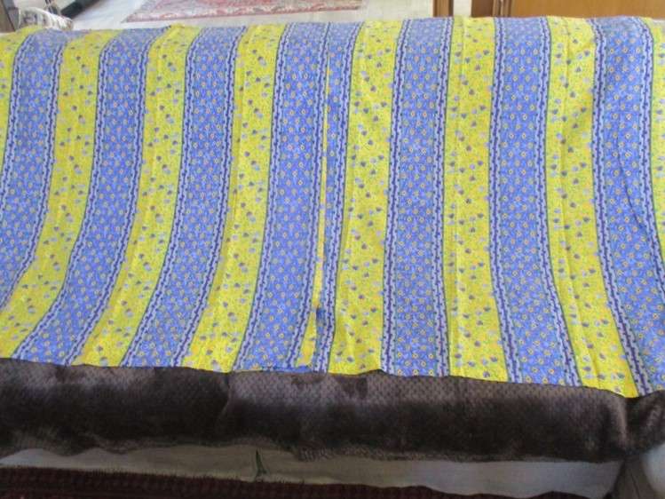 Two cheerful floral curtain drapes