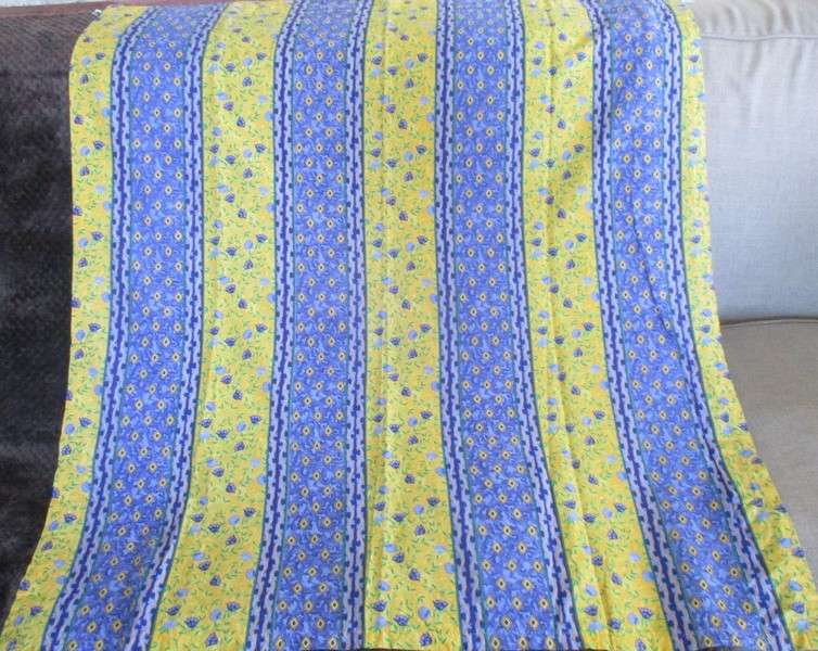 Two cheerful floral curtain drapes