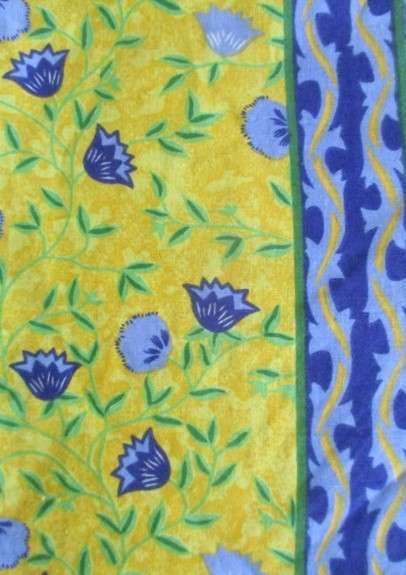 Two cheerful floral curtain drapes