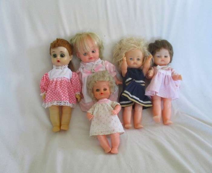 A lot of five vintage dolls including rare French vinyl poupee