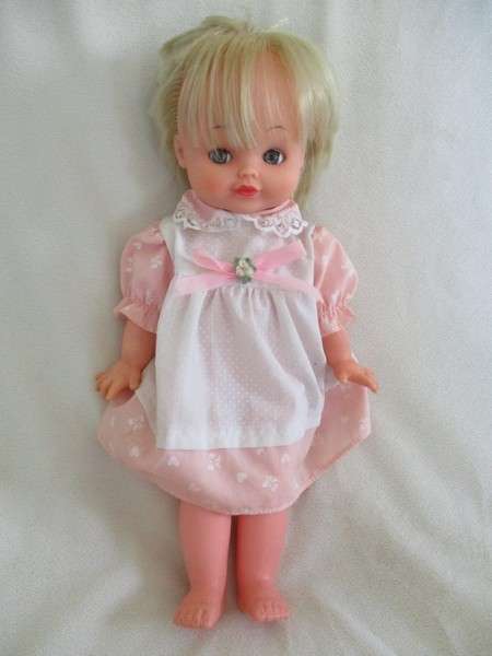 A lot of five vintage dolls including rare French vinyl poupee