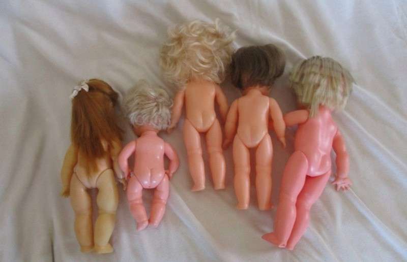 A lot of five vintage dolls including rare French vinyl poupee