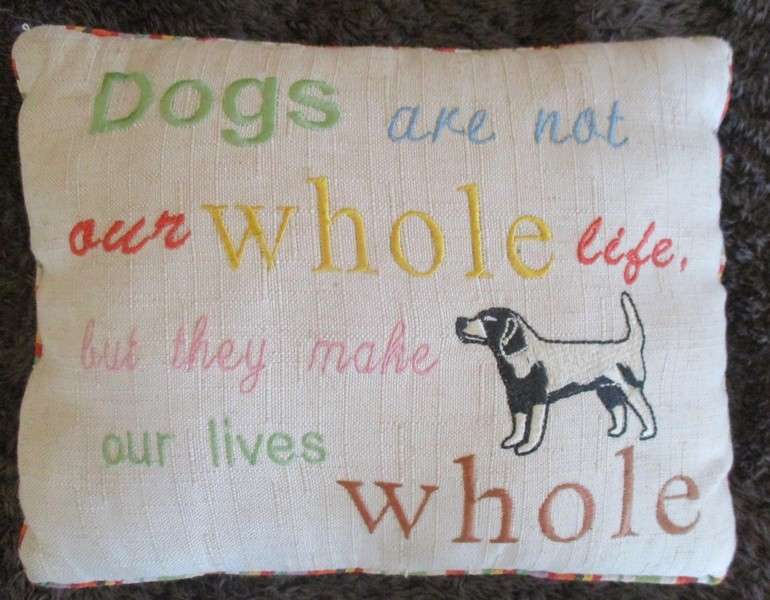 A cute small cushion for a doggy basket