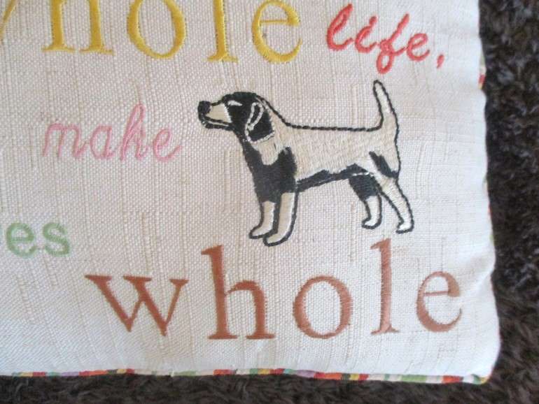A cute small cushion for a doggy basket