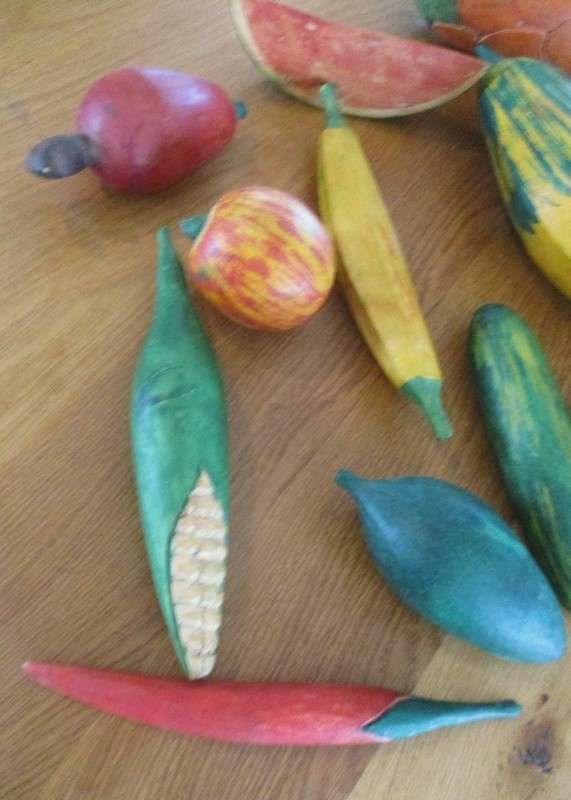 Lot of thirteen large, rustic hand painted fruit and vegetables to display in a bowl