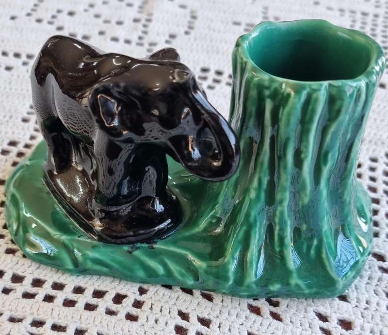 A stunning retro look Lucia ware elephant and tree trunk vase.