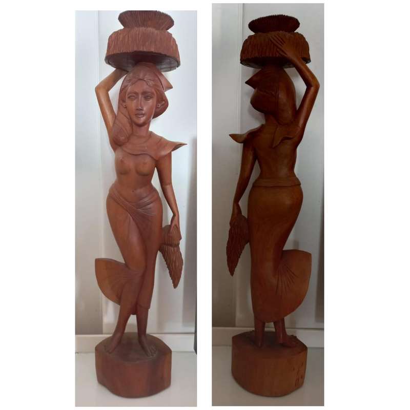 Wooden carved statue of woman