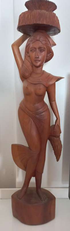 Wooden carved statue of woman