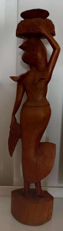 Wooden carved statue of woman