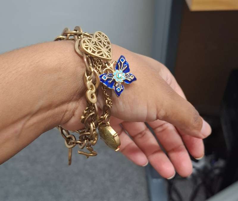GUESS Iconic charm bracelet...over 7 stunning charms