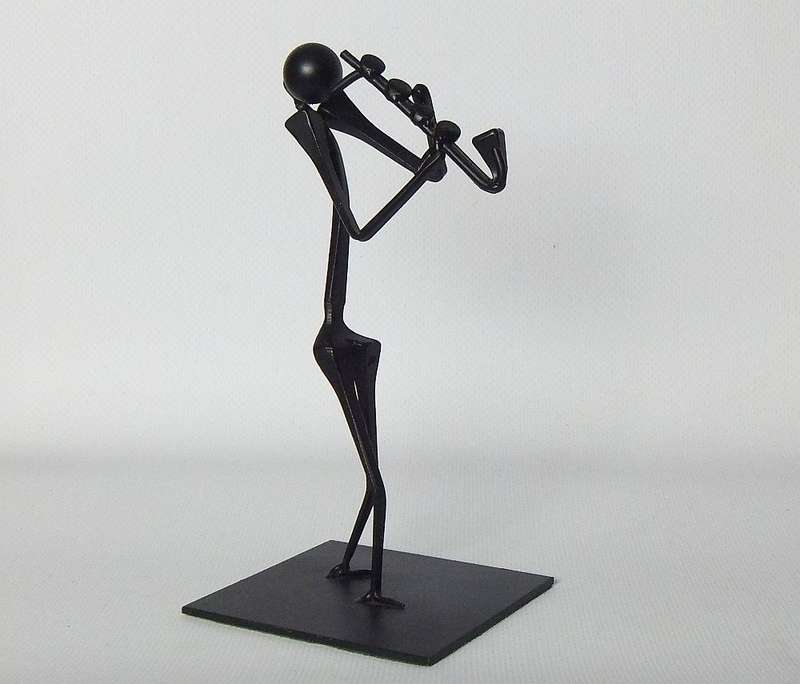 UNDER R100 - Musical figure - Metal - Saxophone player