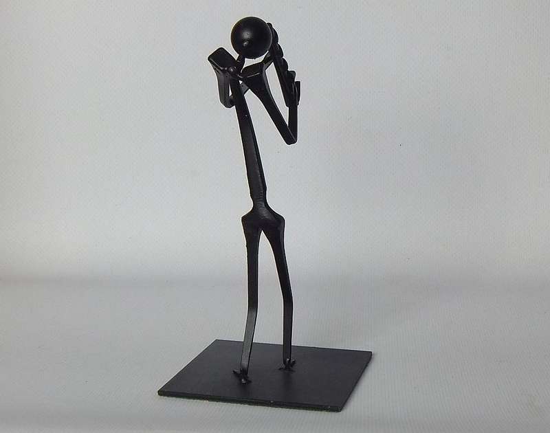 UNDER R100 - Musical figure - Metal - Saxophone player