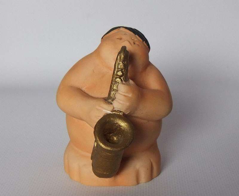 UNDER R100 - Musical figure - Solid resin fat man saxophone player