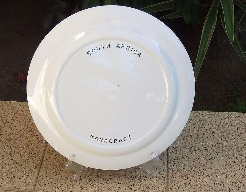 A vintage South African porcelain display plate with elephant motif