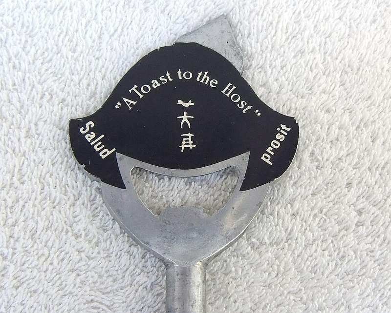 A vintage 1950`s Barmaid corkscrew with bottle opener