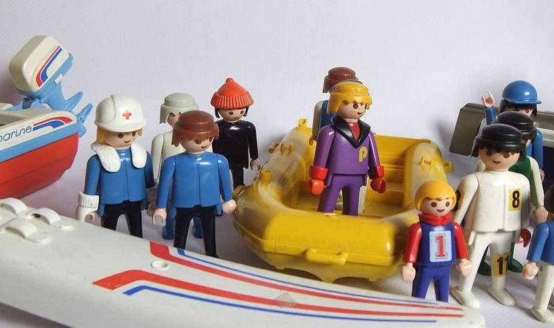 Thirty two pieces of vintage Playmobil toys including animals , boats and accessories