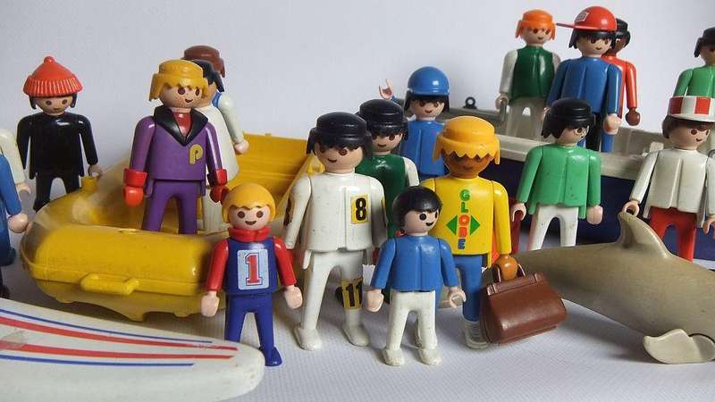 Thirty two pieces of vintage Playmobil toys including animals , boats and accessories