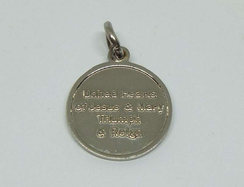 UNDER R100 - Collectable - Sacred heart pendant / fob