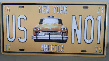 NEW YORK, "YELLOW CAB MEMORABILIA" - EMBOSSED METAL HANGING SIGN "NUMBER PLATE"