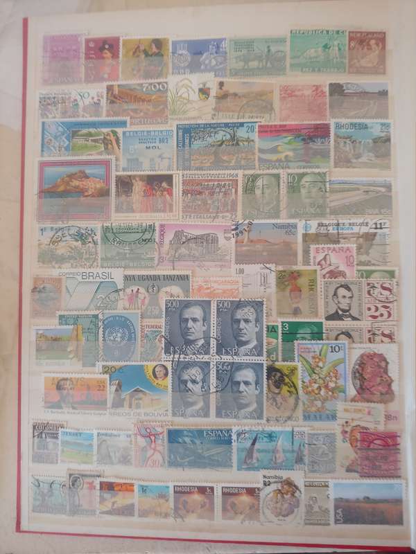 A4 USED LIGHTHOUSE ALBUM LOADED WITH MIXED WORLD STAMPS 16/32 PAGES NOT ALL SHOWN