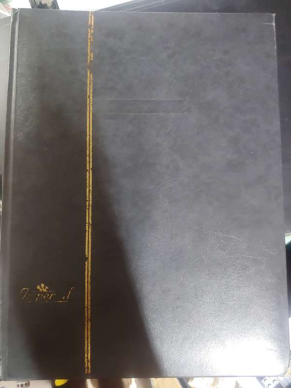 USED BLACK A4 STOCKBOOK WITH 32/64 BLACK PAGES