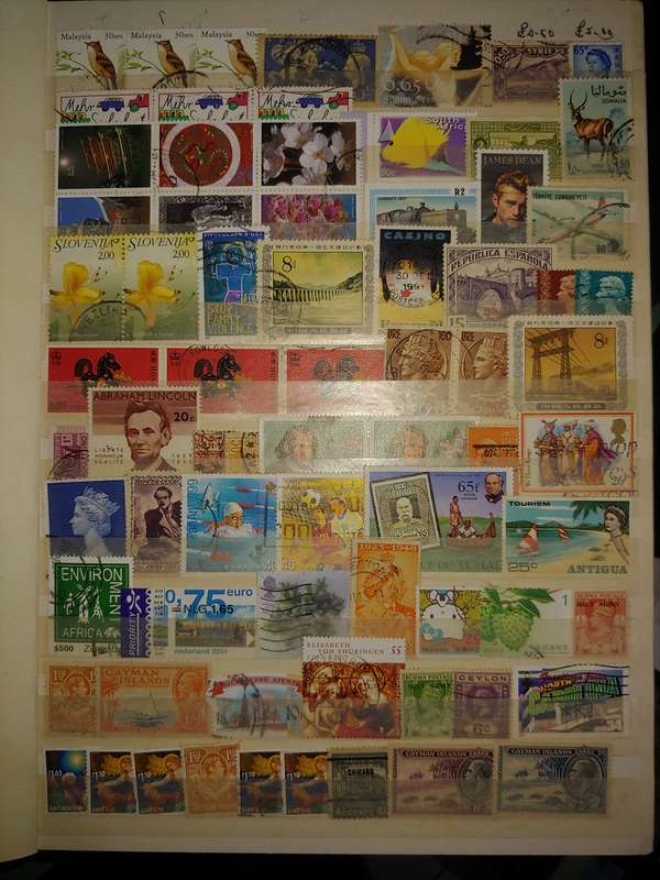 USED A4 STOCKBOOK 16/32 PAGES LOADED WITH WORLD STAMPS WRITING ON PAGES STAMPS GOOD VALUE