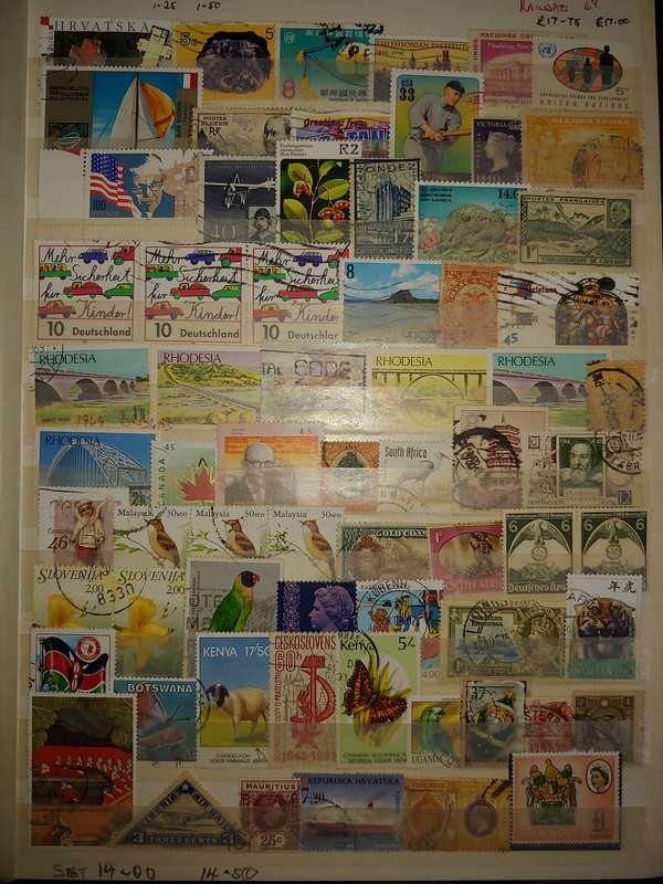USED A4 STOCKBOOK 16/32 PAGES LOADED WITH WORLD STAMPS WRITING ON PAGES STAMPS GOOD VALUE