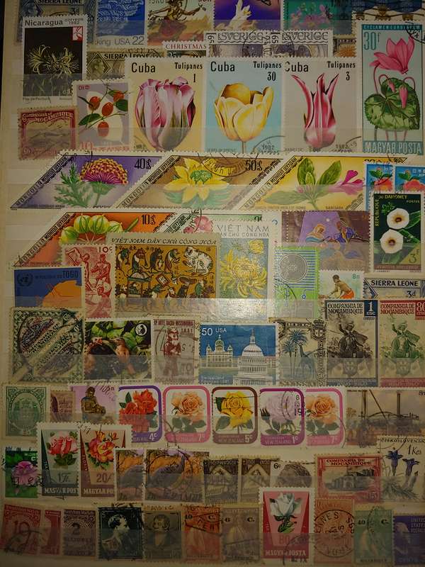 USED A4 STOCKBOOK 16/32 PAGES LOADED WITH WORLD STAMPS WRITING ON PAGES STAMPS GOOD VALUE